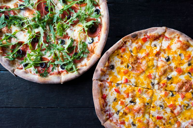 Mushroom and Truffle round table pizza with fresh mushrooms